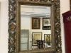 Grand miroir en bois sculpté