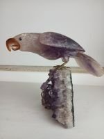 Oiseaux en quartz sur socles améthyste