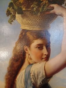 Jeune fille au panier de fruits