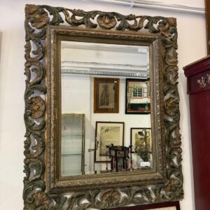 Grand miroir en bois sculpté